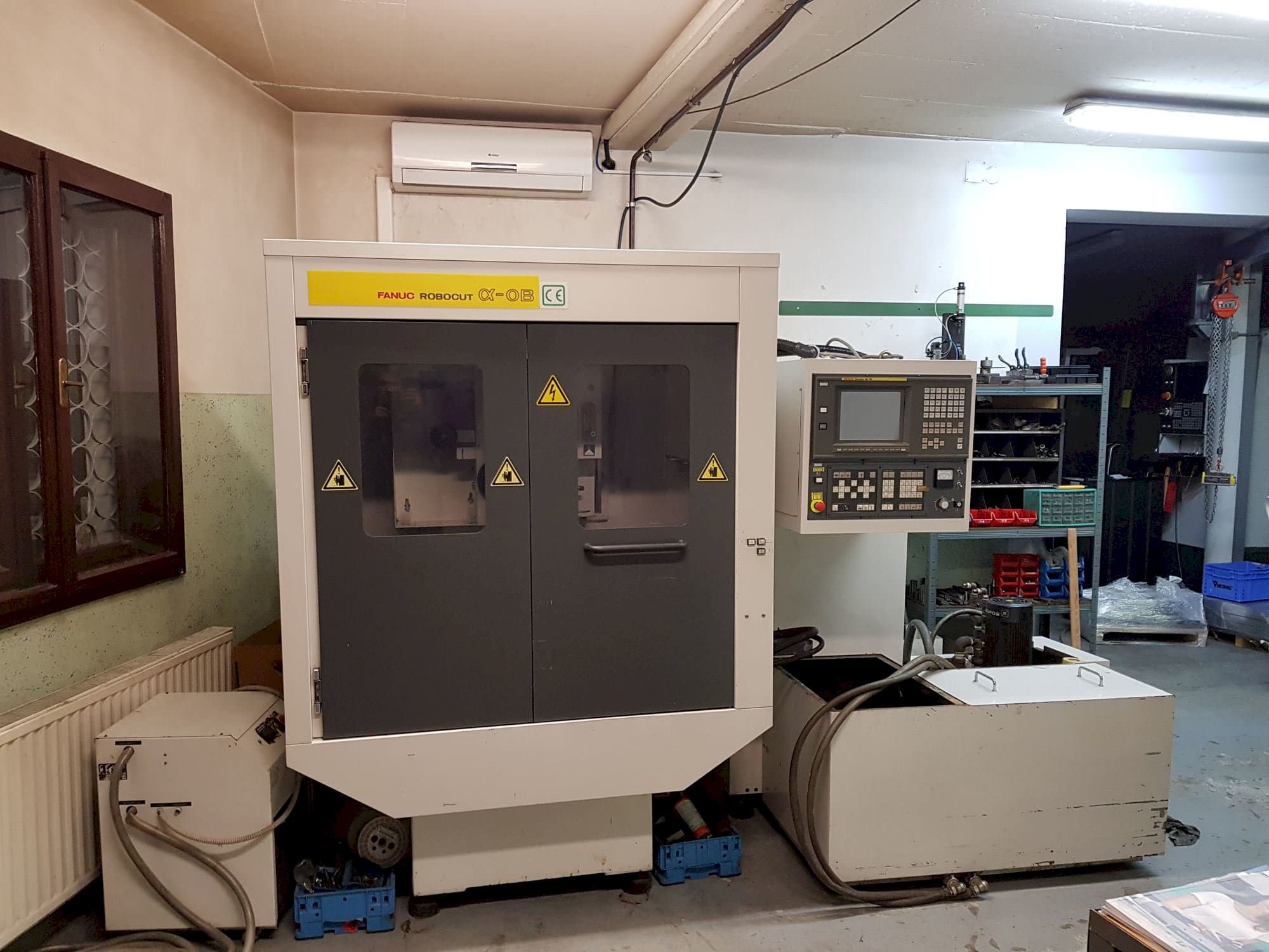 Koneen  FANUC Robocut ALPHA- 0B etunäkymä