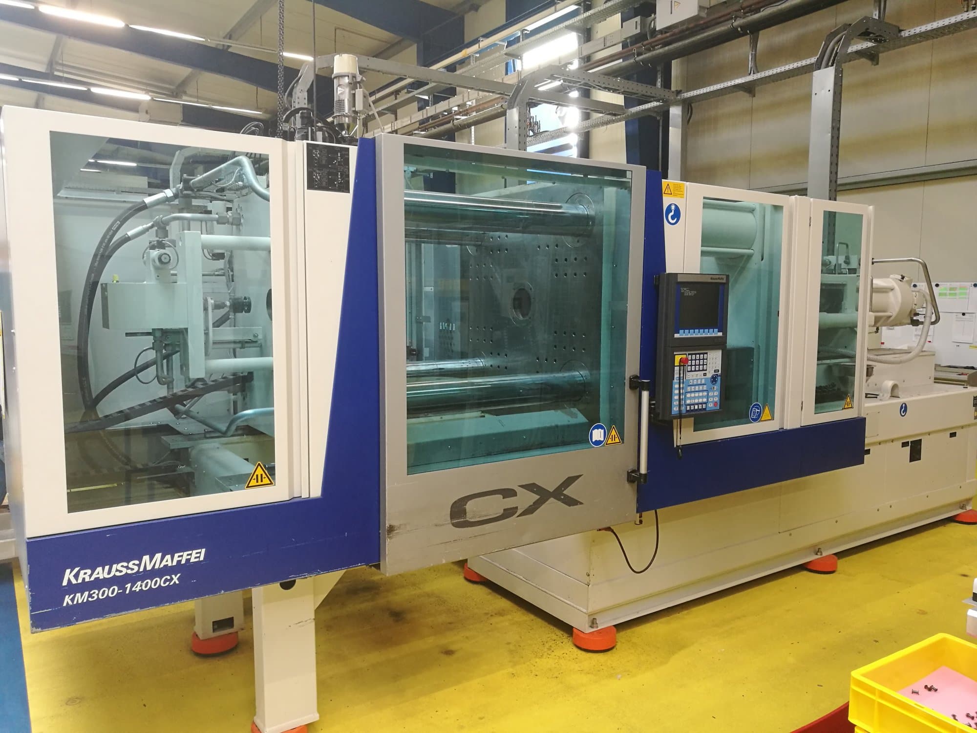 Koneen  Krauss Maffei etunäkymä 300-1400 CX