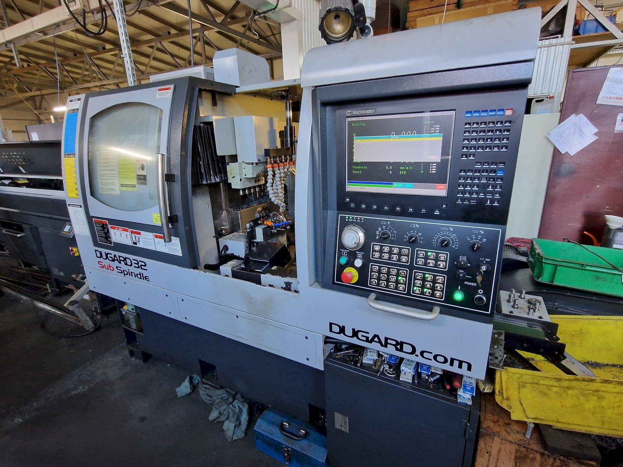 Koneen  Dugard									 32 Sub Spindle etunäkymä