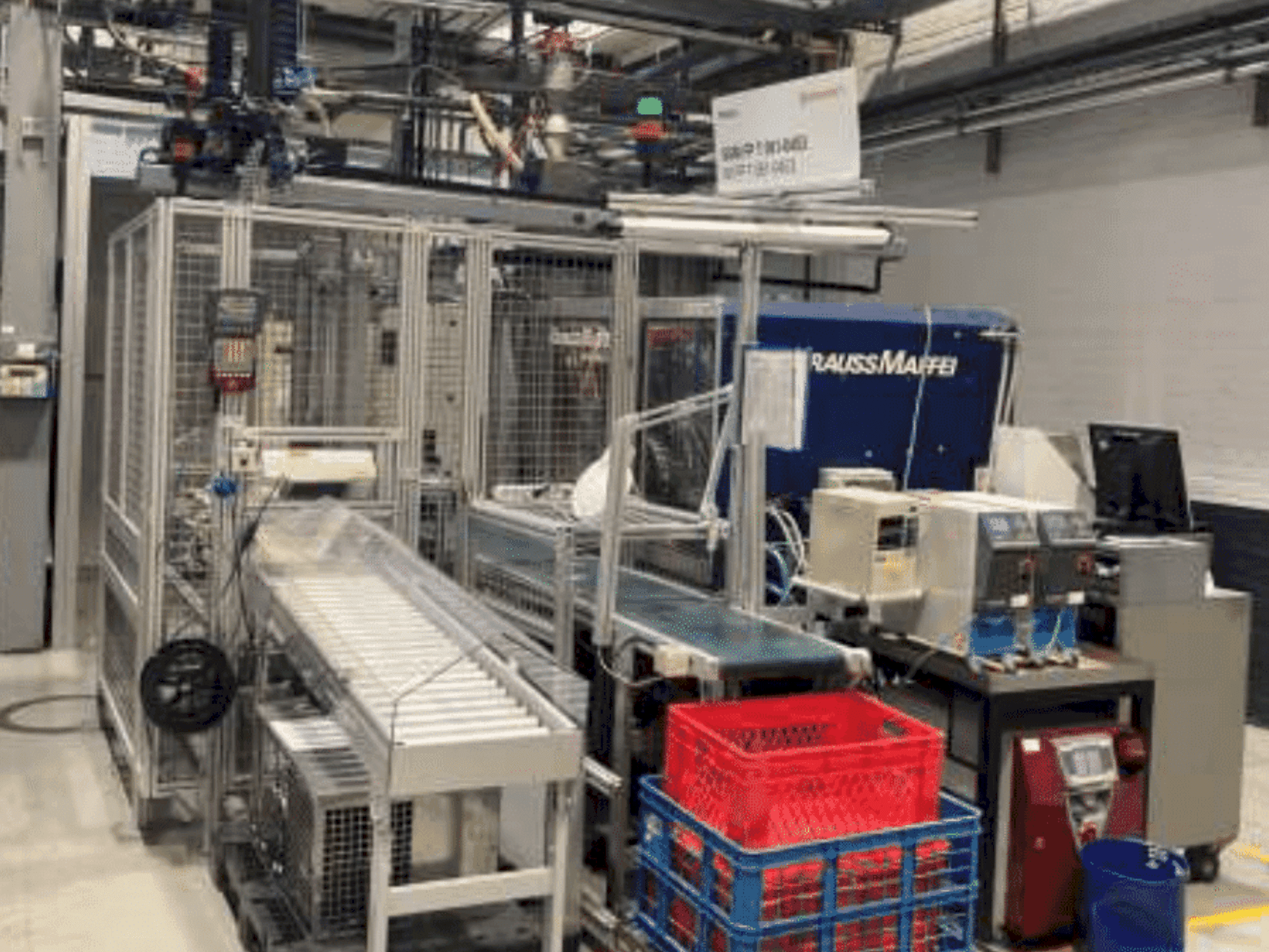 Koneen  Krauss Maffei KM 125-390 C2 etunäkymä