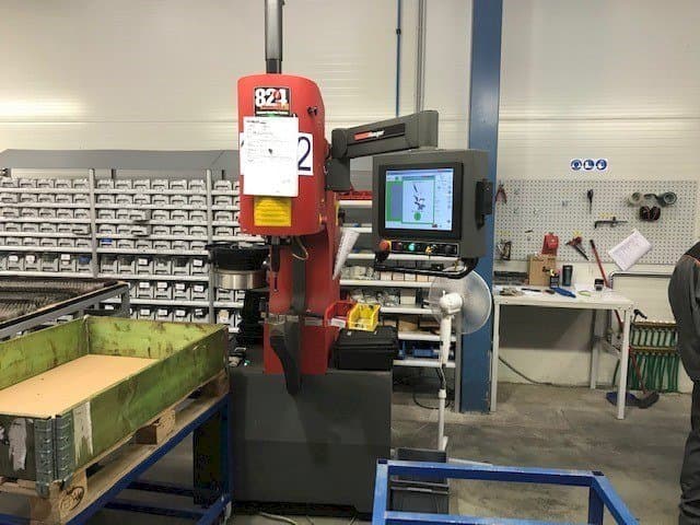 Koneen  Haeger WT-824 4e vasemman sivun näkymä