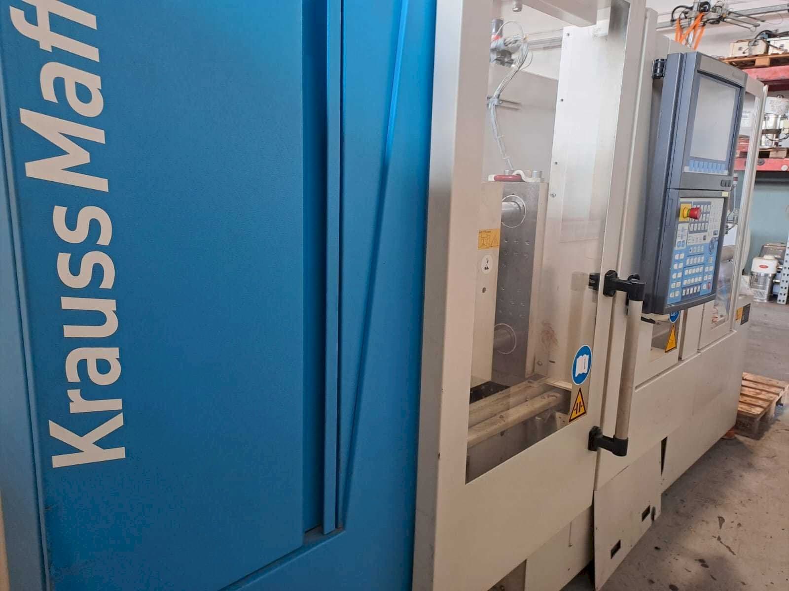 Koneen  Krauss Maffei 35-180CX etunäkymä