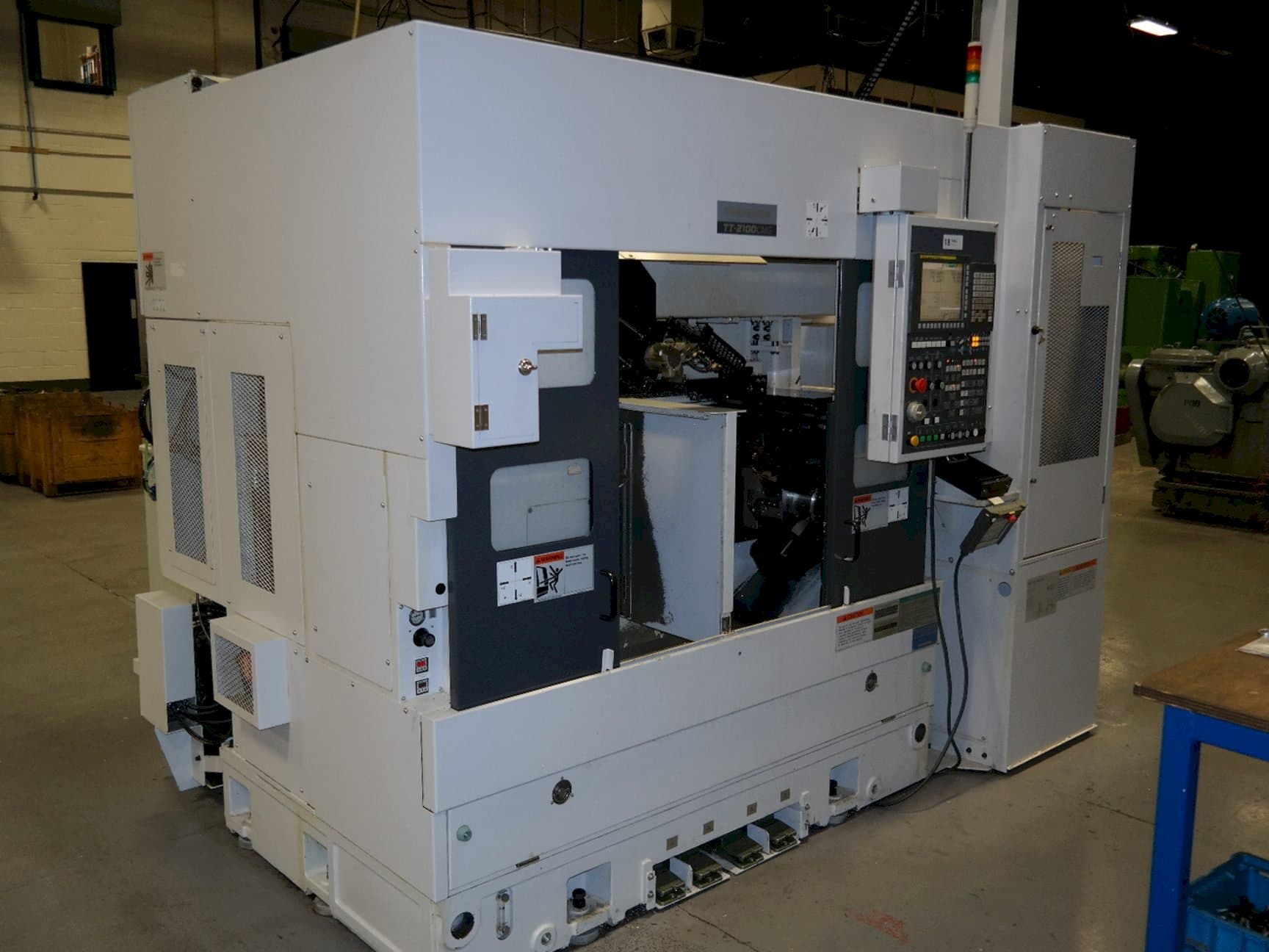 Koneen  Takisawa TT2100CMGA etunäkymä