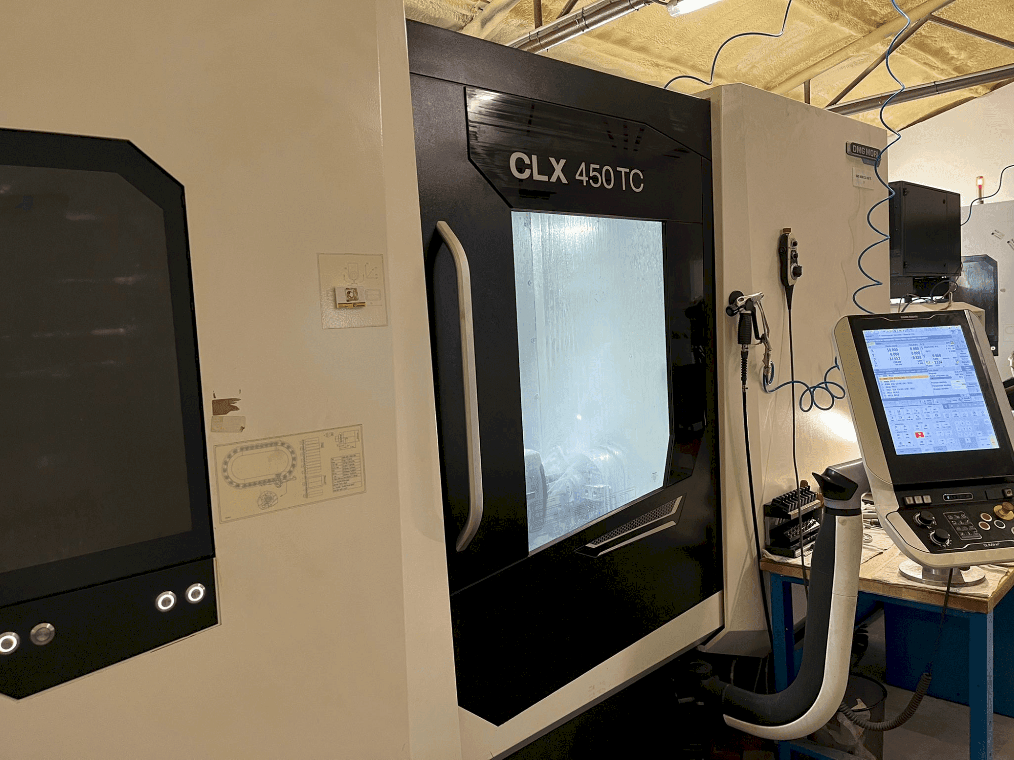 Koneen  DMG MORI CLX 450 TC etunäkymä