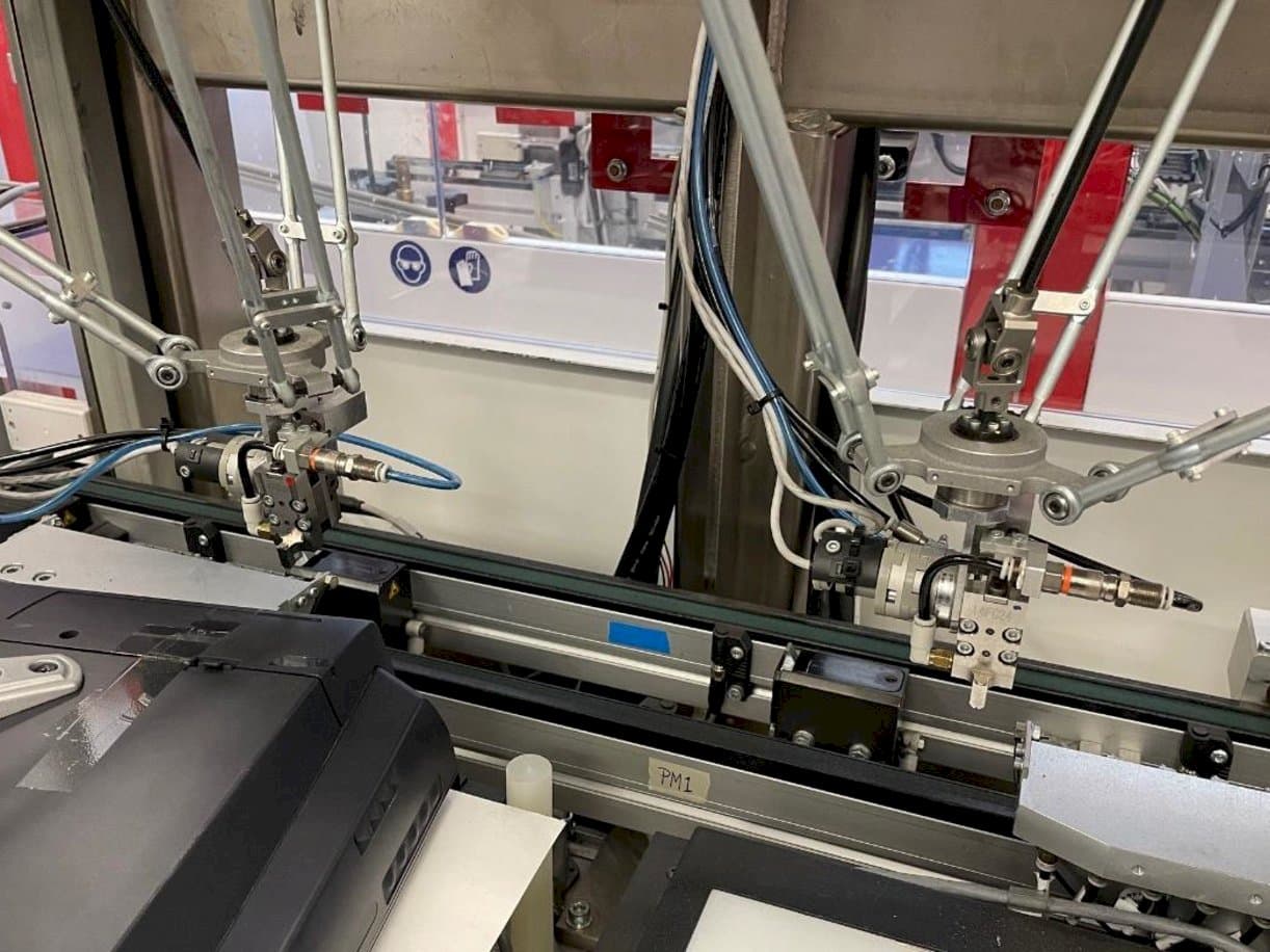 Koneen  IMS Tattoo Assembly Line etunäkymä