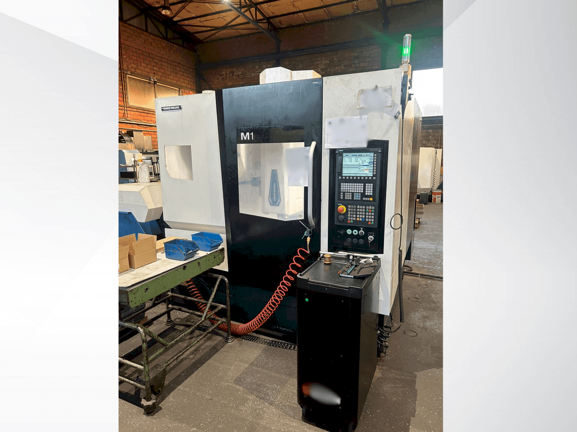 Koneen  DMG MORI M1 PRO etunäkymä