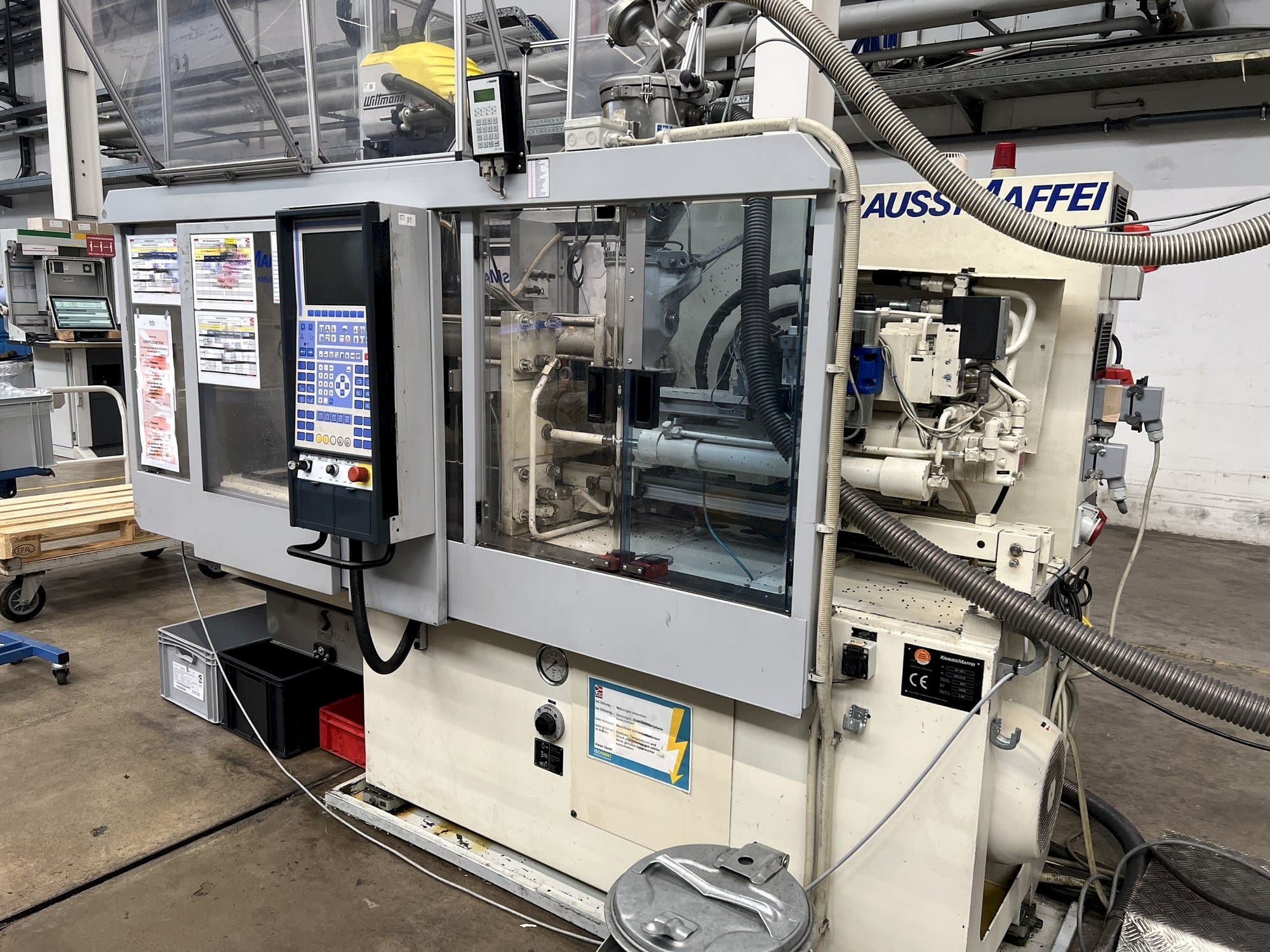 Koneen  Krauss Maffei KM 50-125 C1 etunäkymä