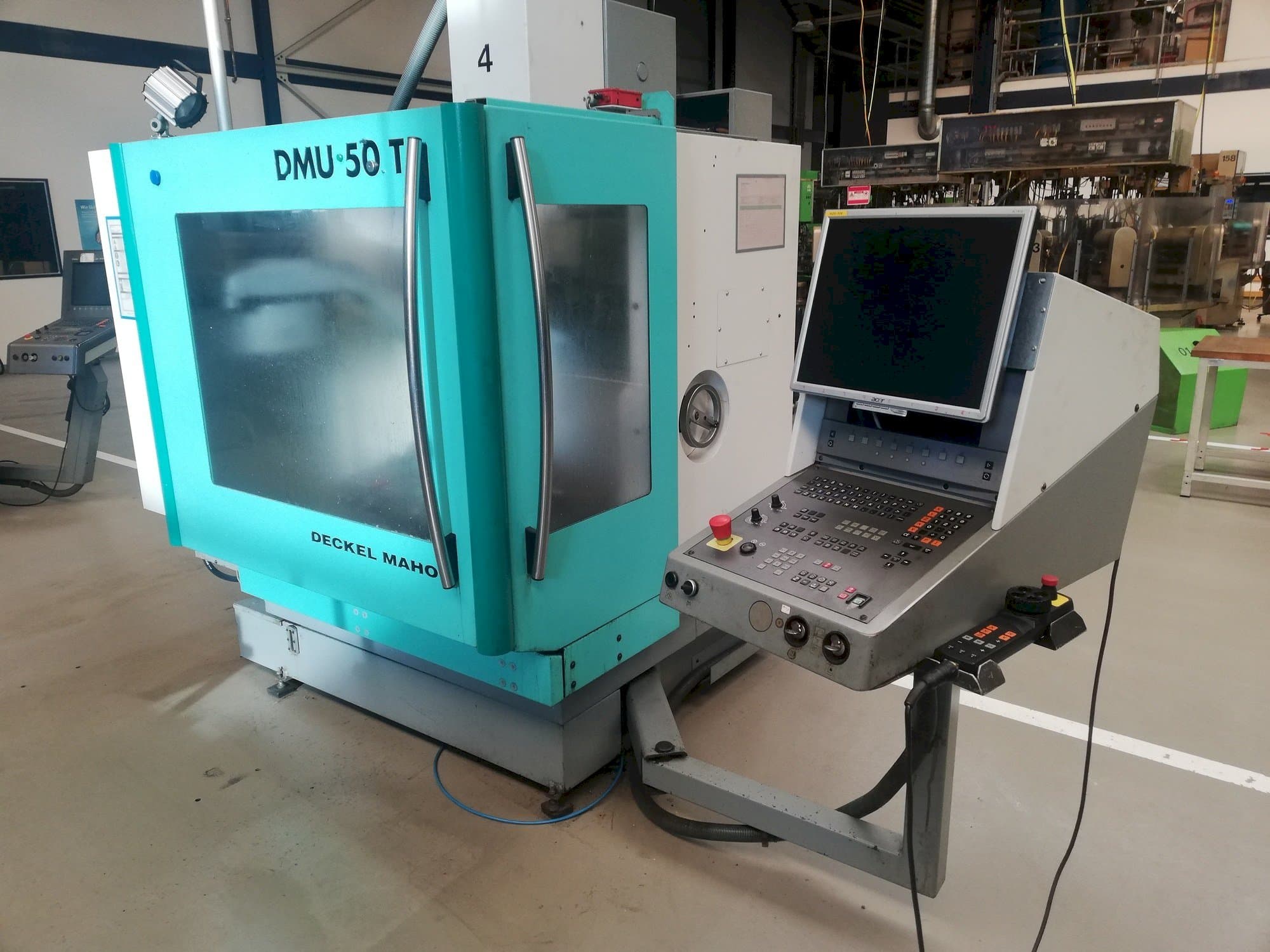 Koneen  DECKEL MAHO DMU 50T etunäkymä