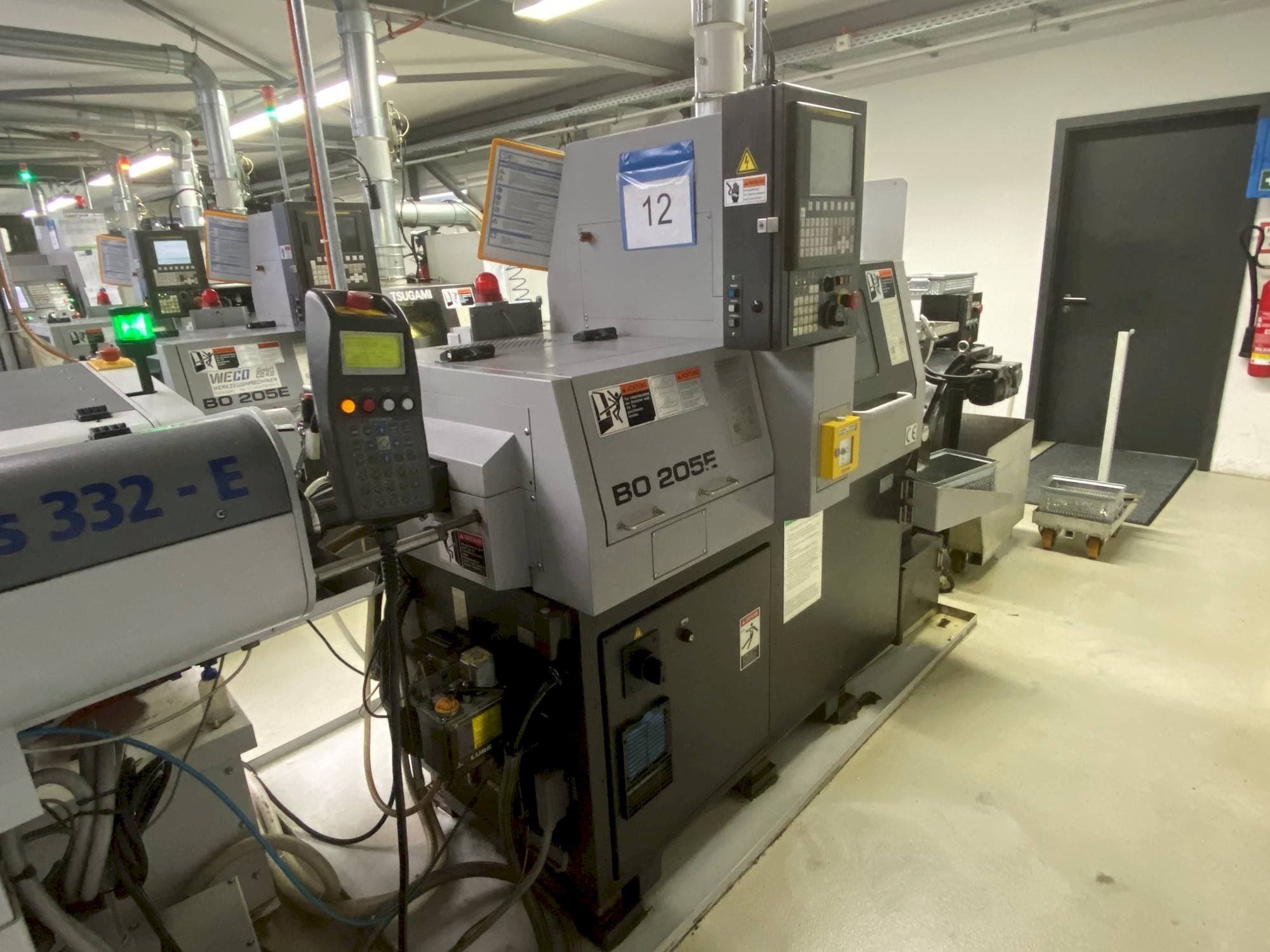 Koneen TSUGAMI Bo205 Eii etunäkymä