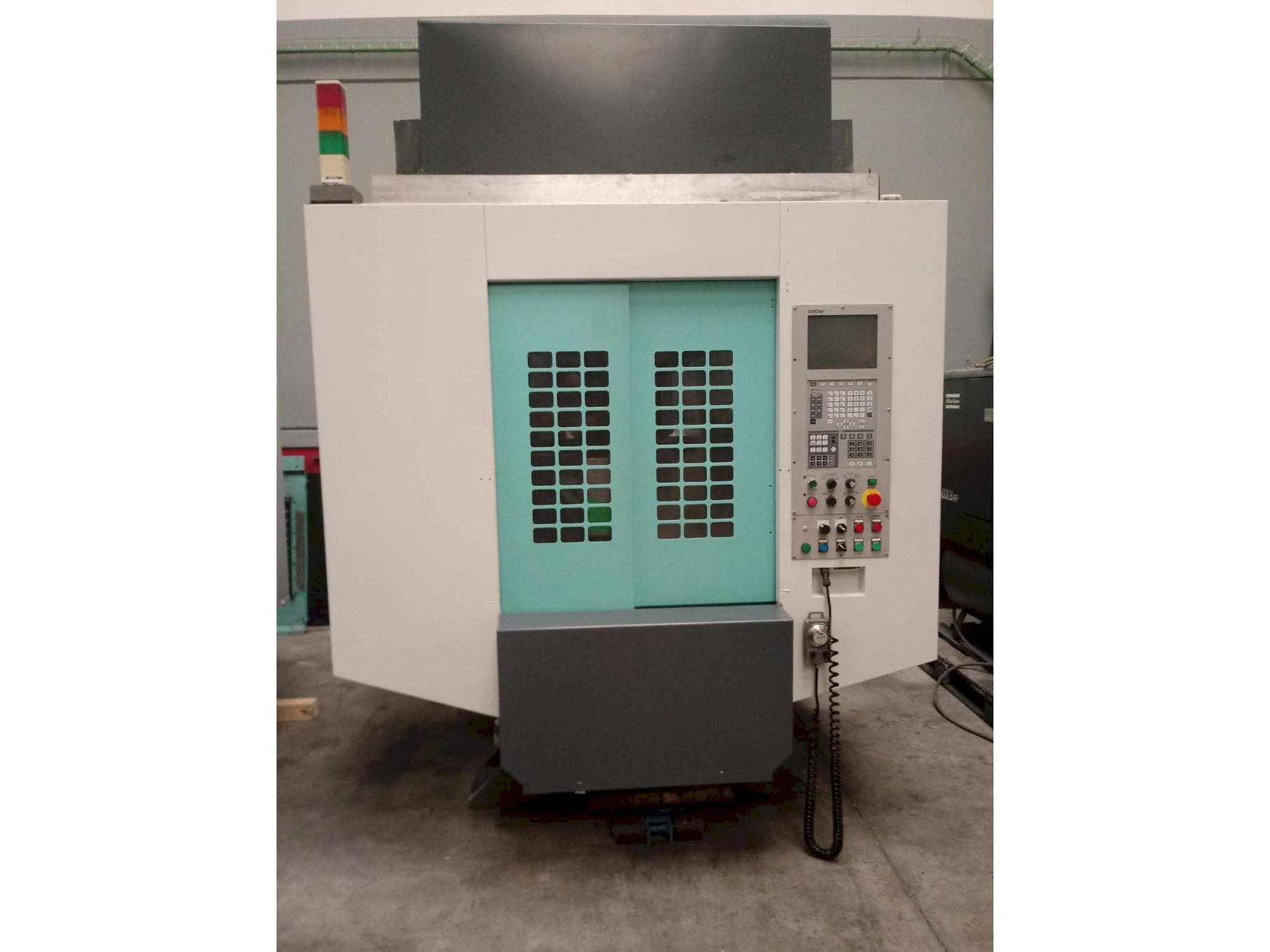 Koneen  Brother TC-S2DN-O etunäkymä