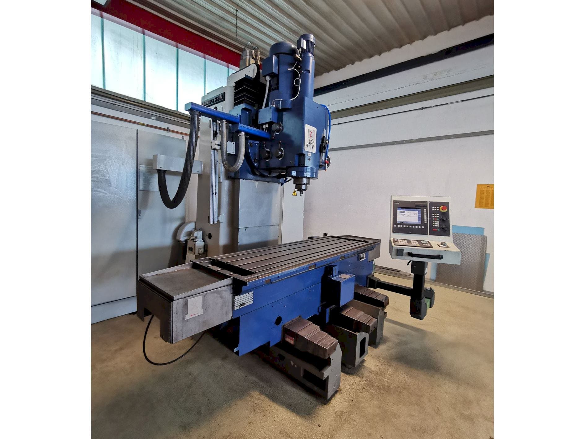 Koneen  Droop & Rein FS 100 ke etunäkymä