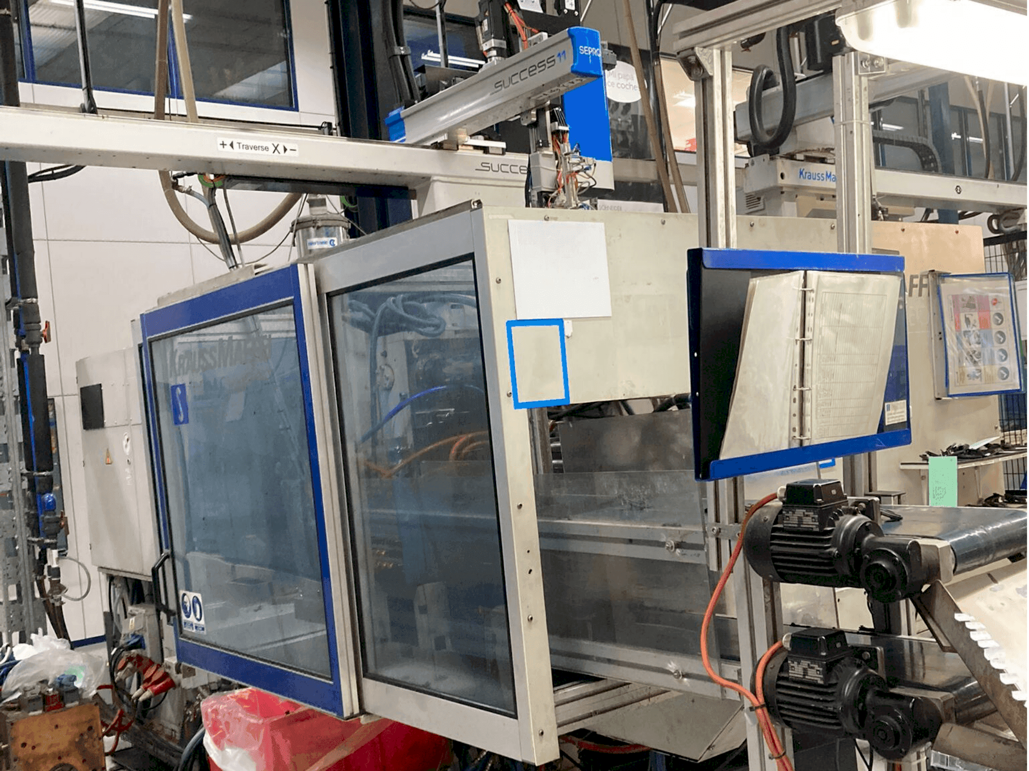 Koneen  Krauss Maffei 150-700 C2 etunäkymä