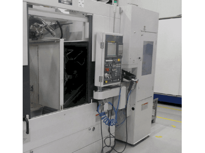 Koneen  Takisawa TT-2600G etunäkymä