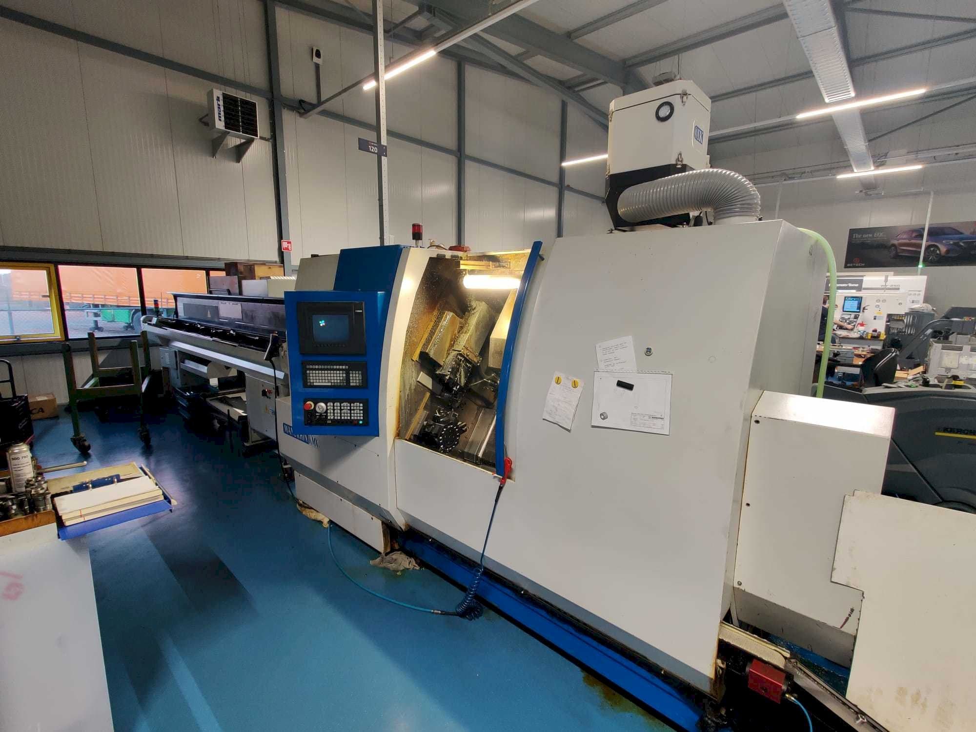 Koneen  Manurhin K'MX XL 32 etunäkymä