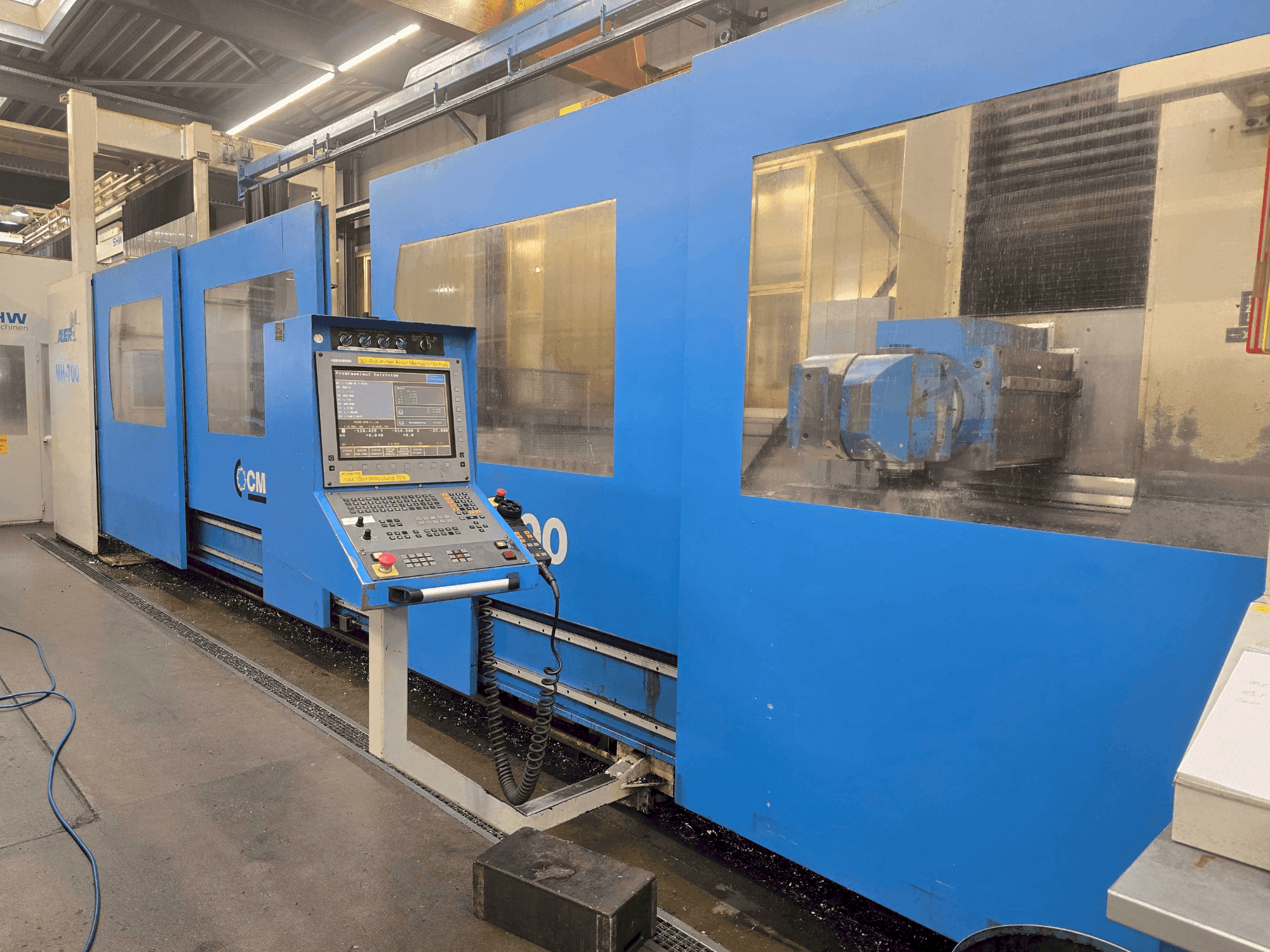 Koneen  CME MH-700 etunäkymä