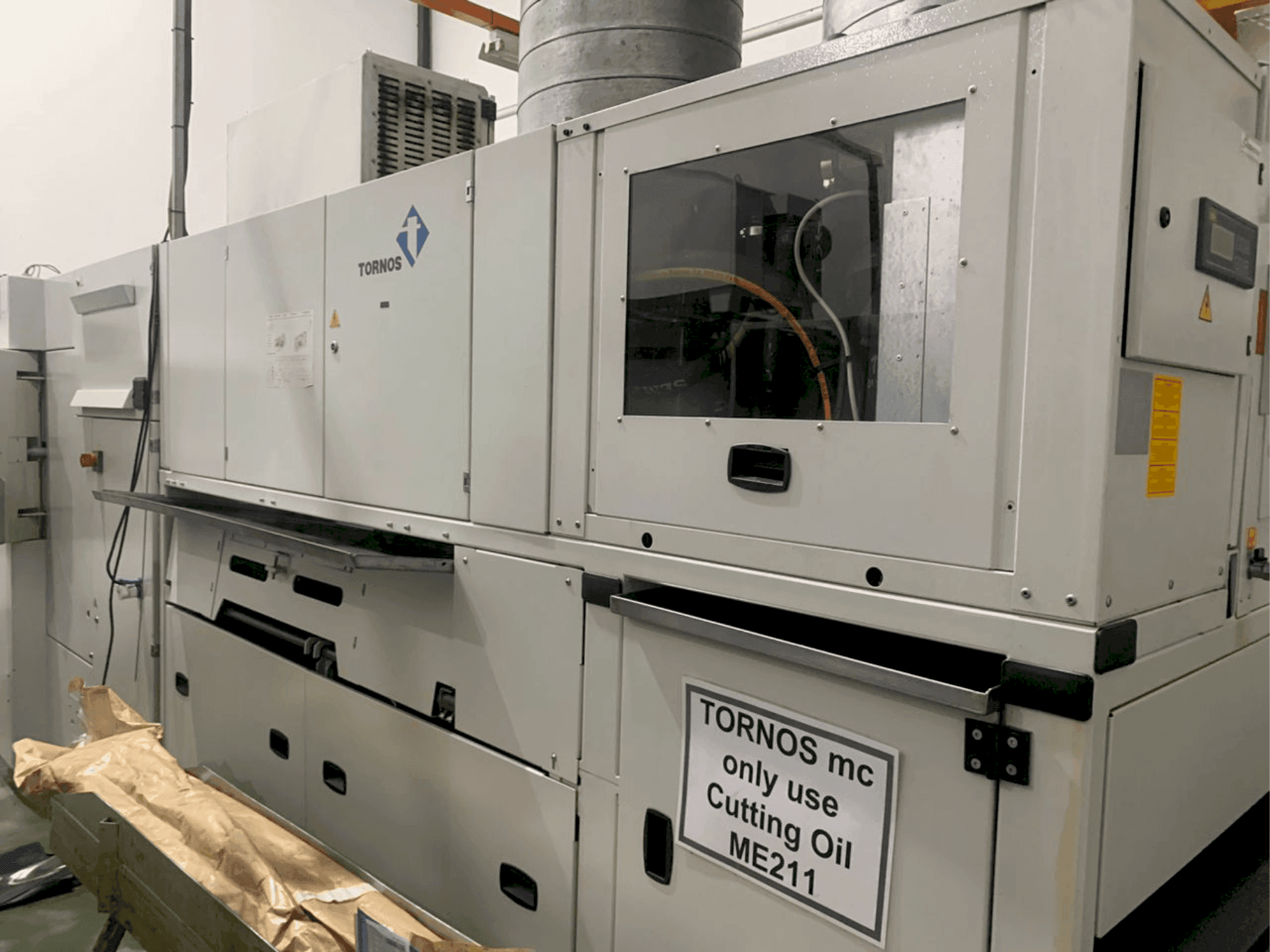 Koneen  TORNOS MultiSWiss 6x14 etunäkymä