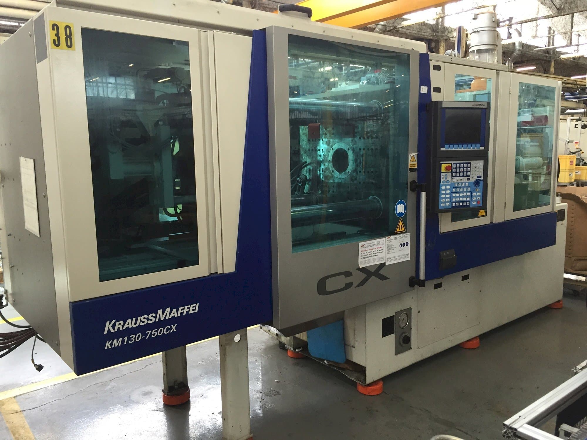 Koneen  Krauss Maffei 130-750 CX etunäkymä