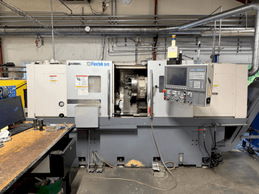 Koneen  Okuma Genos L300E-M with FMB Turbo 8-80 etunäkymä