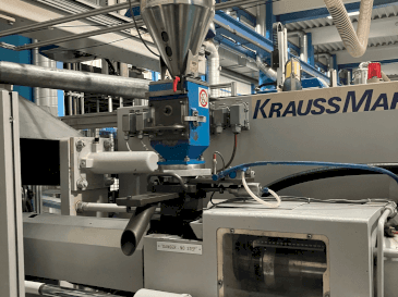 Koneen  Krauss Maffei 125-520 C1 etunäkymä