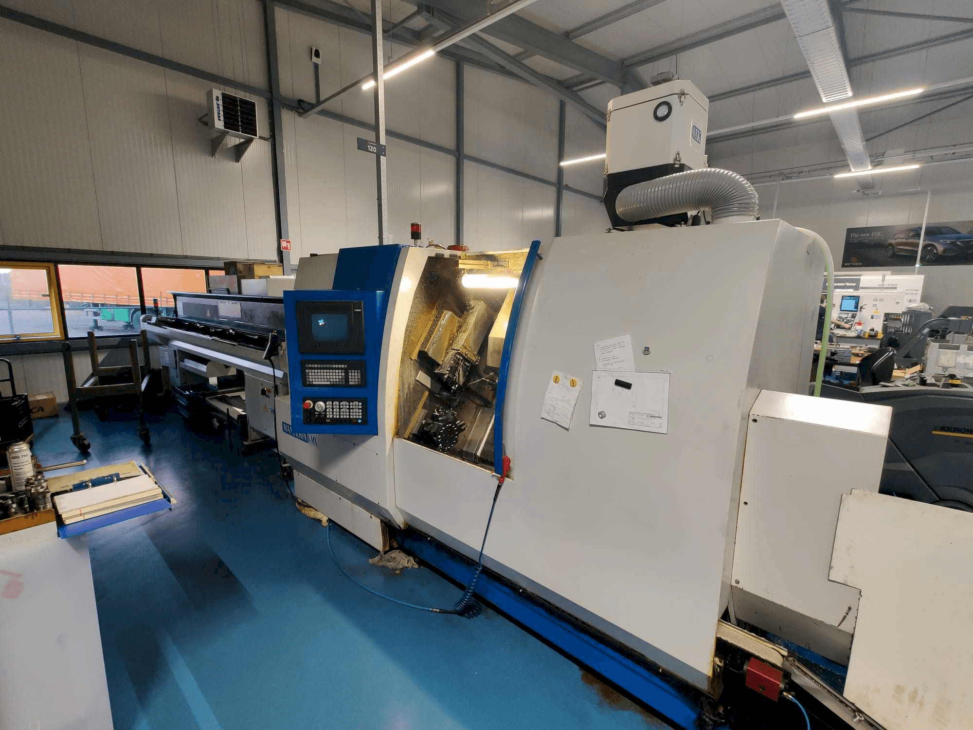 Koneen Manurhin K'MX XL 32 etunäkymä