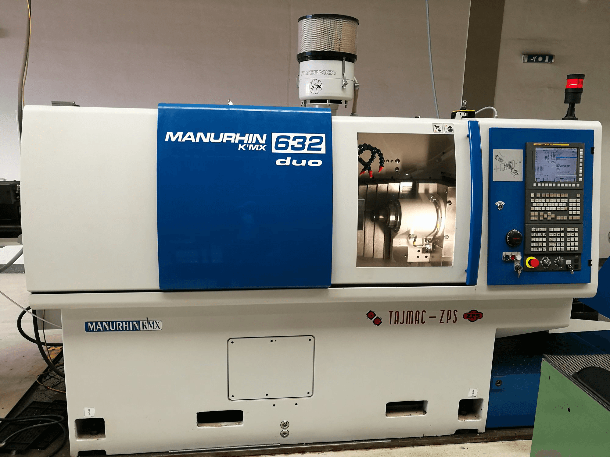 Koneen TAJMAC-ZPS etunäkymäMANURHIN K'MX 632 DUO