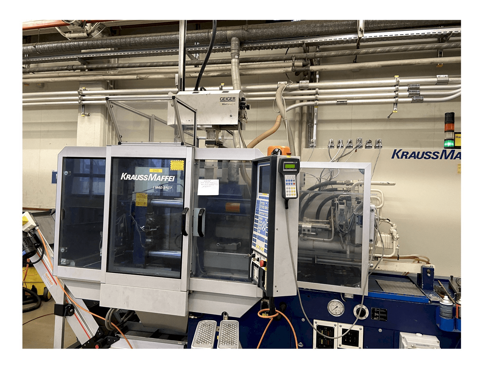 Koneen Krauss Maffei 40-55 C2 etunäkymä