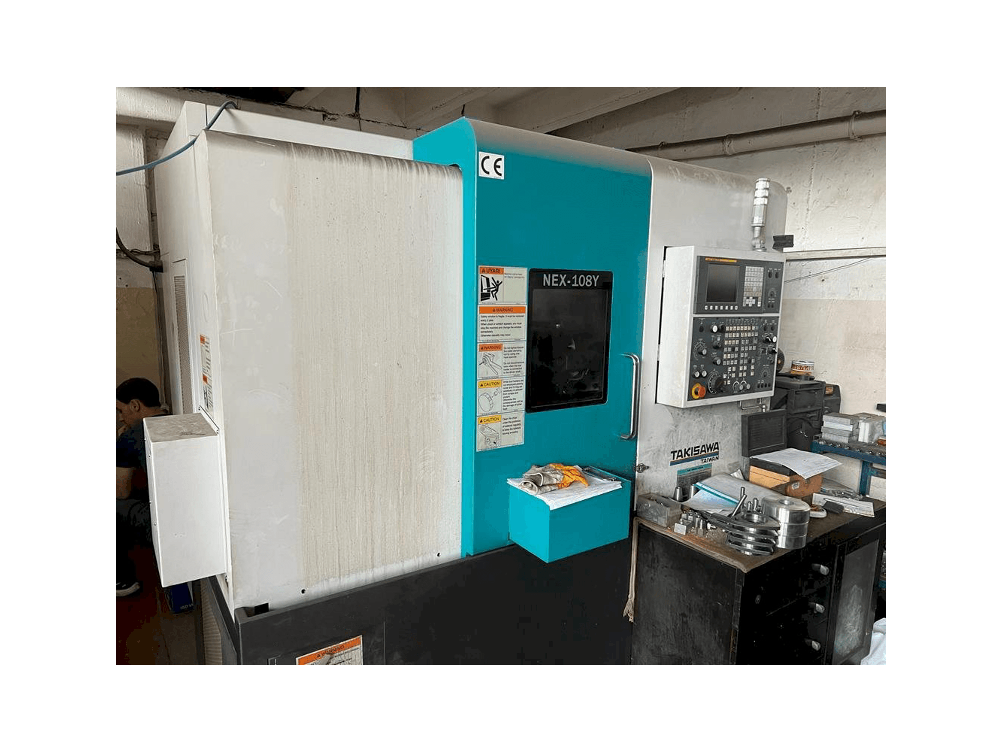 Koneen Takisawa NEX-108Y etunäkymä