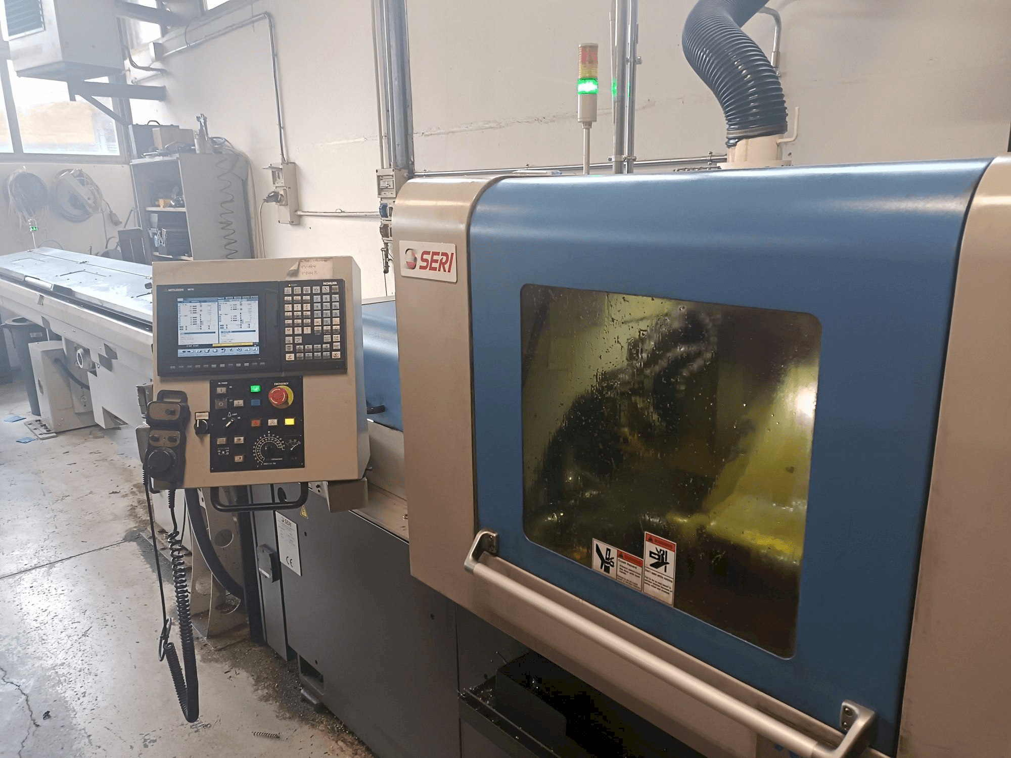 Koneen NOMURA etunäkymä