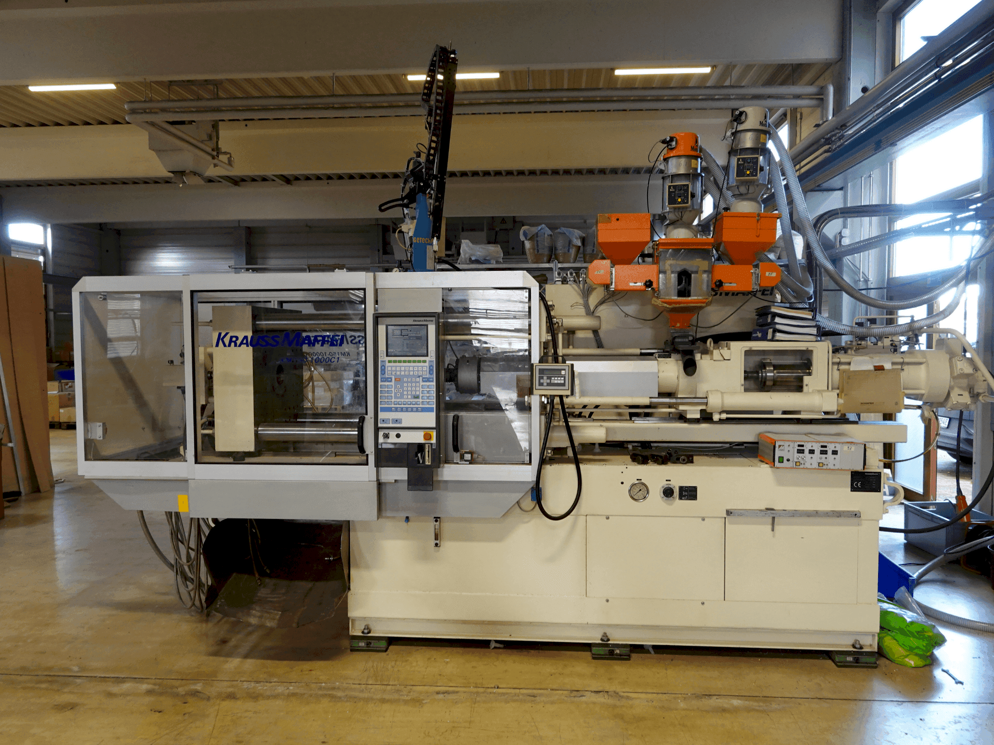 Koneen Krauss Maffei KM 150-1000 C1 etunäkymä